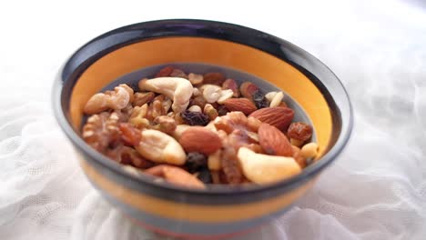 mixed nuts in a colorful bowl