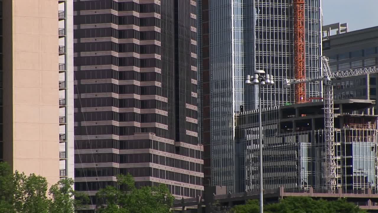Panup Of Three Tall Buildings In The City Of Atlanta And Then Back To The Skyline Of The City