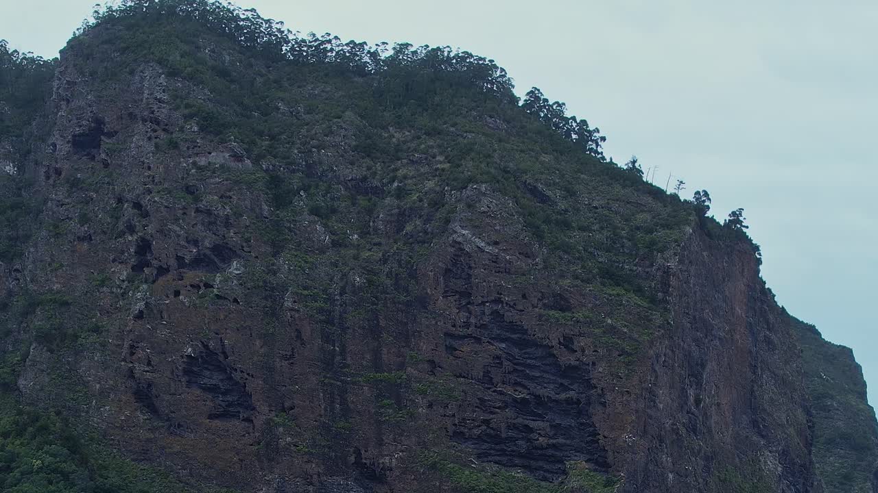 Explore the dramatic cliffs of Madeira from above with drone view