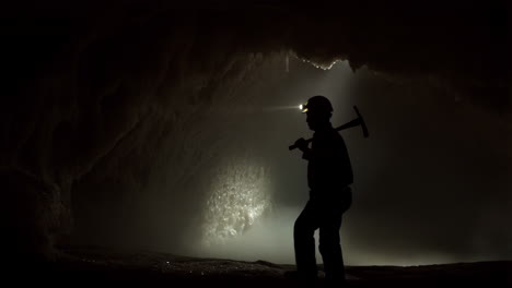 miner in a dark cave