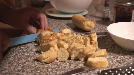 Cutting-Brioche-Rolls-to-make-Sponge