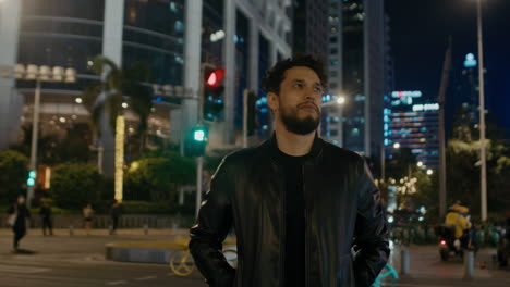 man walking in night city