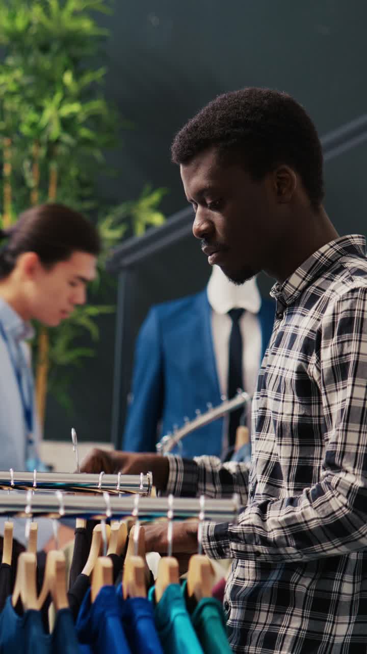 Man shopping for clothes at a retail store