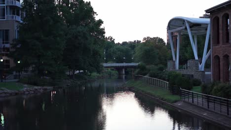 bridge shot overlooking a river in greenville, sc