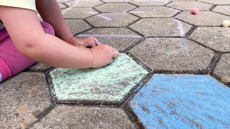 Kids paint outdoors
