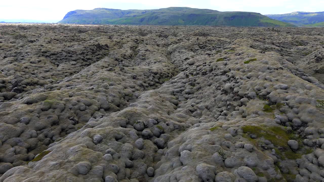 Discover a place in Iceland where the landscape mirrors the moon, captured beautifully from above.