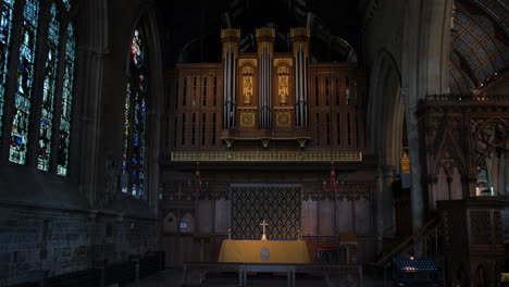 an alter and organ in a large church cathedral