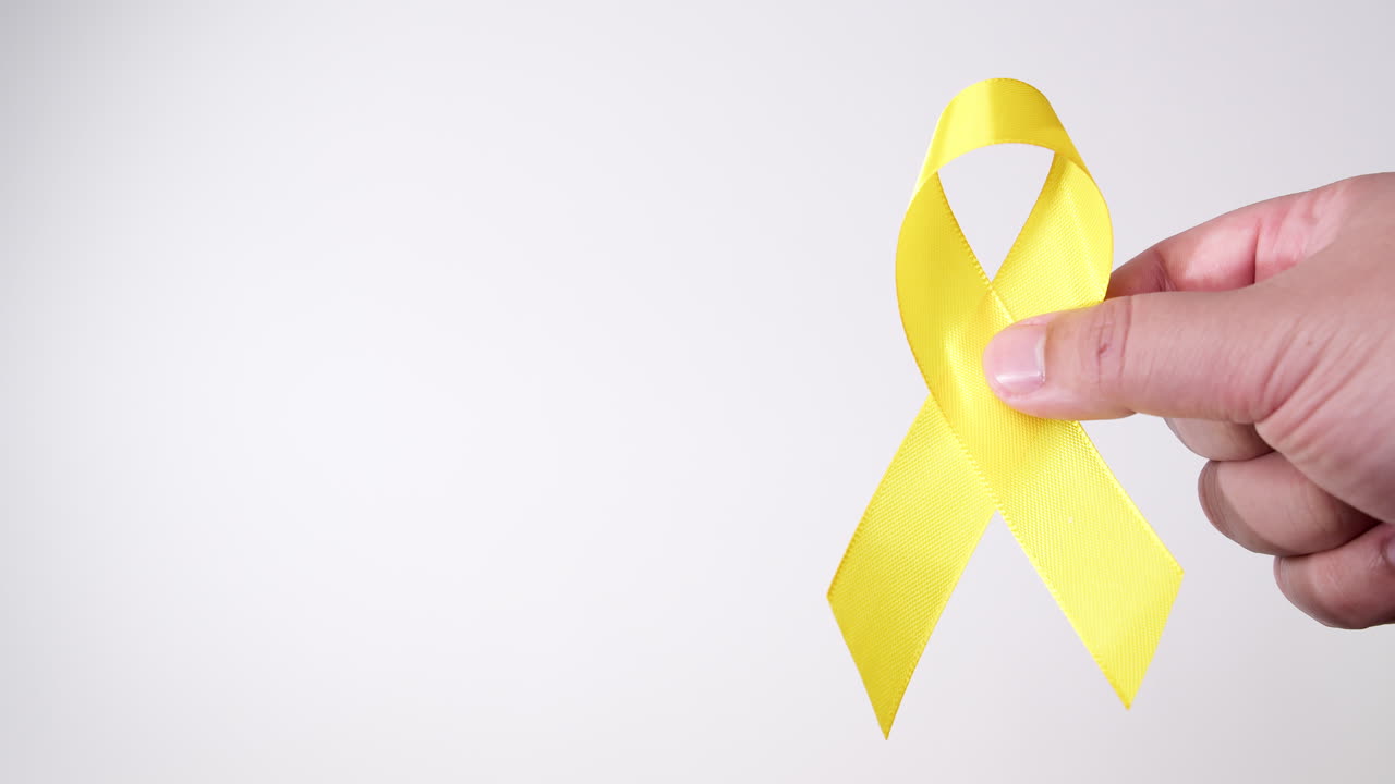 Giornata della prevenzione del suicidio, Mese della consapevolezza per l'infanzia, il sarcoma, il cancro alle ossa e alla vescica e Nastro Giallo a sostegno della vita e della malattia delle persone