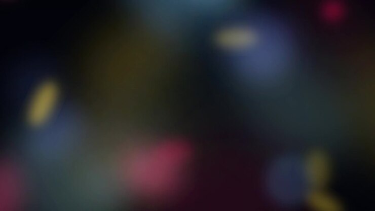 Sfondo astratto con luci bokeh colorate e bagliori soffusi