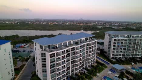 aerial push over condos near eagle beach aruba