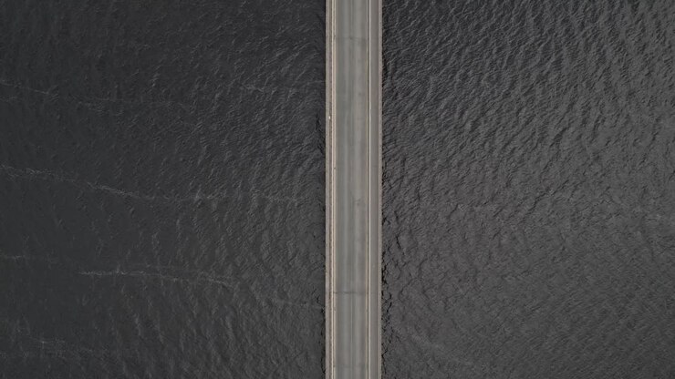 Top View Of Cars Driving On The Bridge Across Blessington Lake In County Wicklow, Ireland