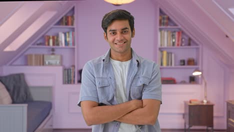 Successful-Indian-boy-standing-crossed-hands