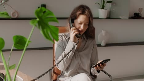 businesswoman on phone and smartphone