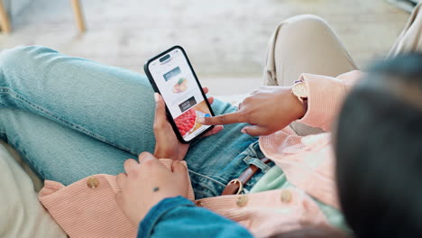 couple, hands and phone screen of food delivery