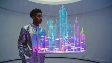 man looking at futuristic city hologram