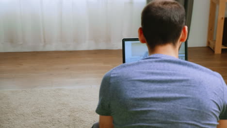 man with beer in a video call