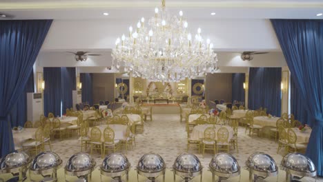 drone view capturing beautiful decor of wedding in a luxury banquet in pakistan.