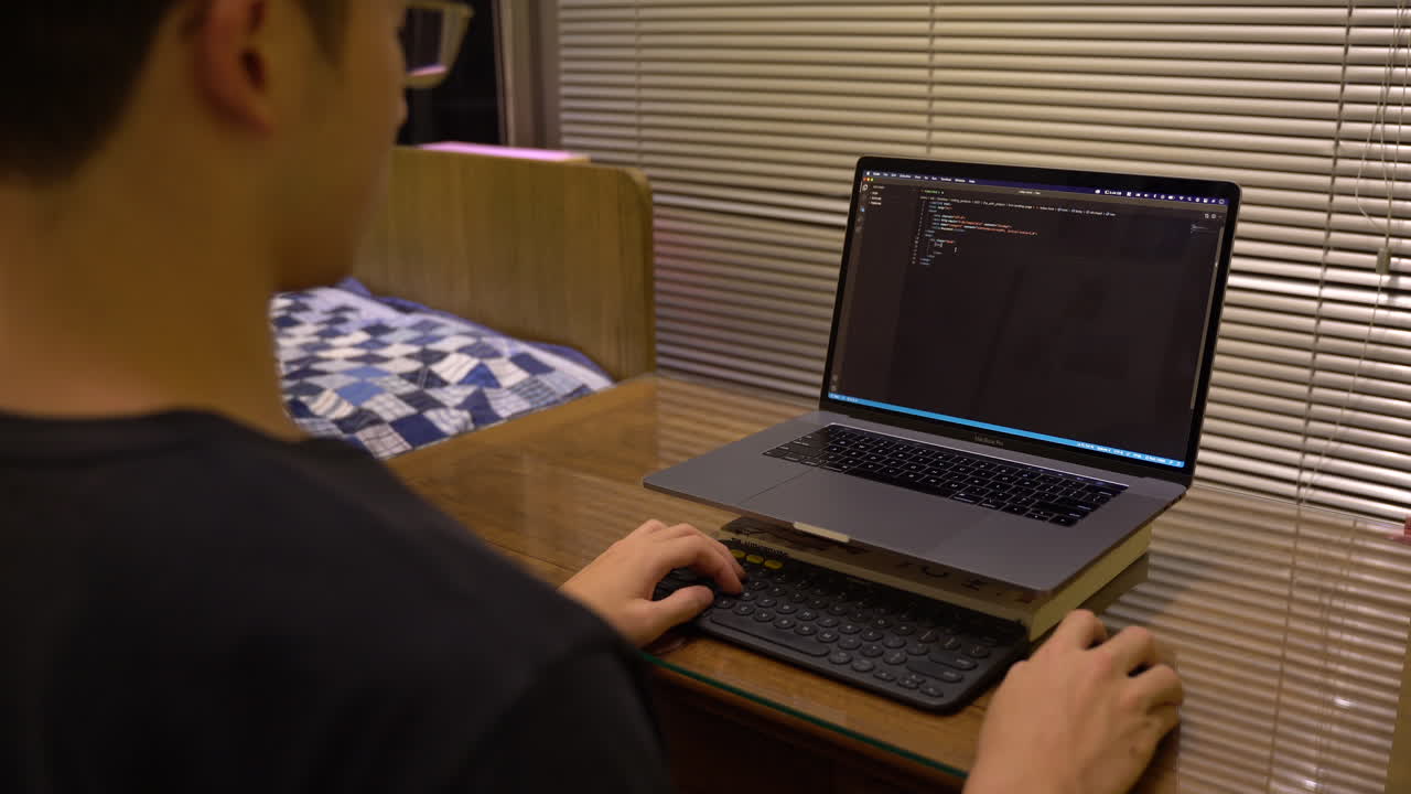 Programmer Creating Website Landing Page Using Visual Studio Code. time lapse