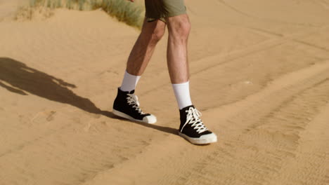 man with black backpack walking