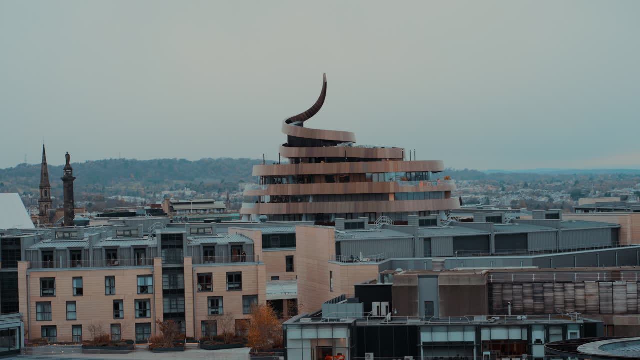 Cinematic Shot of Edinburgh Cityscape from Calton Hill at Sunset Featuring St James Quarter – Poo Building Golden Hour View