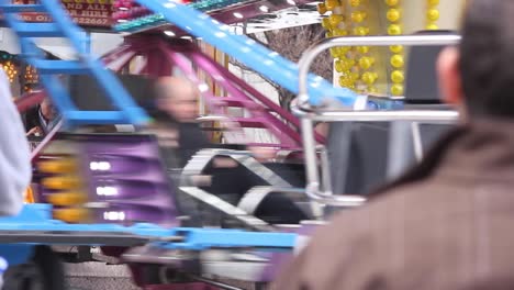 people enjoying amusement park in dublin city centre, ireland