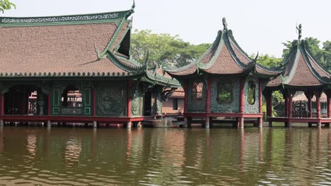 serene lake with classical asian buildings