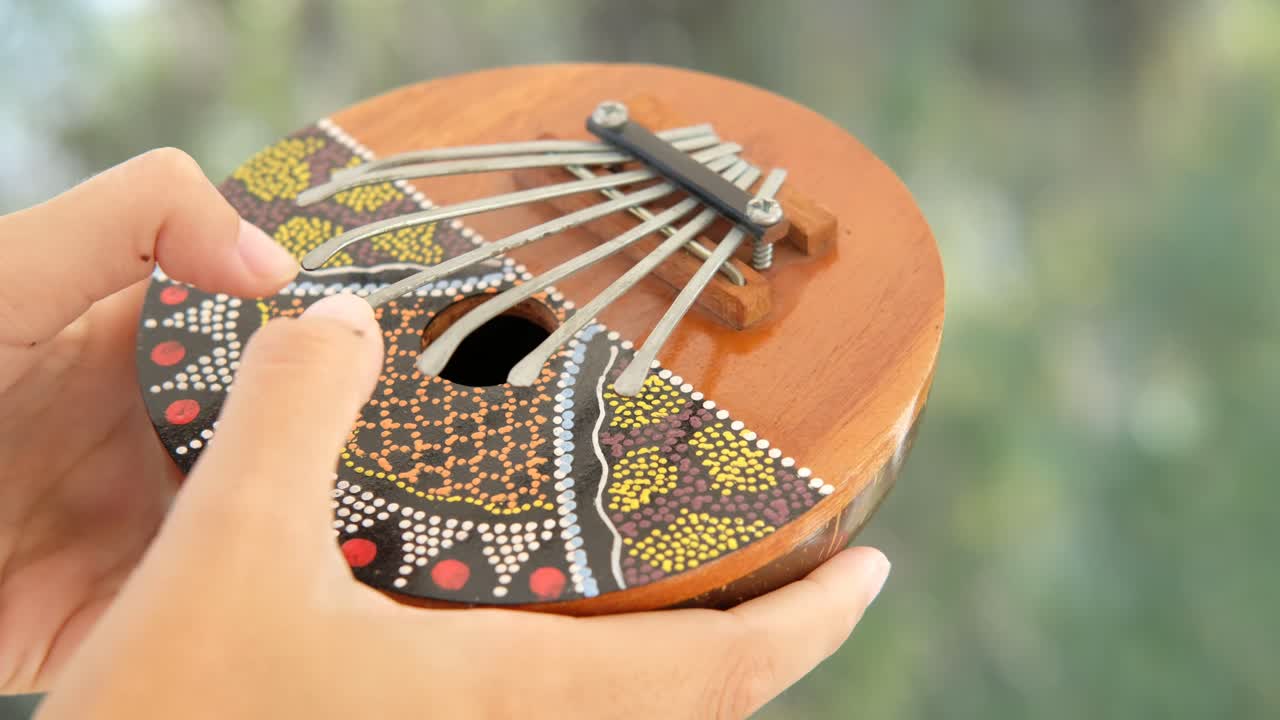 A close up of a kalimba, also known as a thumb piano or mbira. African trdicional instrument.