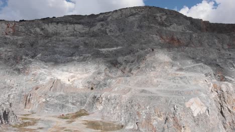 drone flight old empty abandon quarry clouds shadow on top sunny day