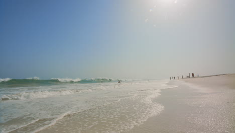 beautiful beach scene with people on a sunny day