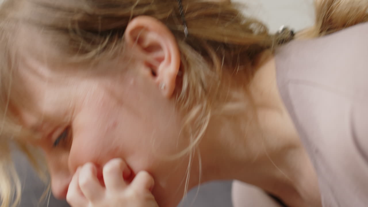 Tender Mother Kissing Happy Baby Boy
