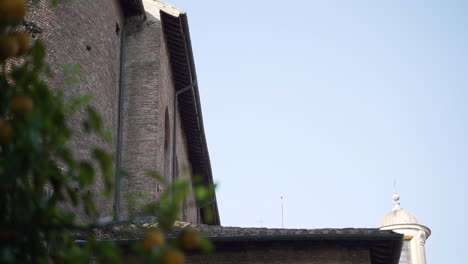 Reveal-of-classic-old-Italian-building-in-Rome-in-summer