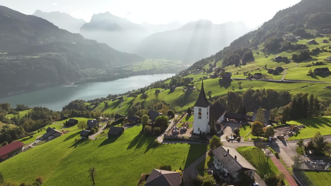 Amden village with cauldron at sunrise. A beautiful view of the lake creates an idyllic holiday resort