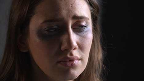 Studio-Portrait-Shot-Of-Unhappy-Woman-With-Smudged-Make-Up