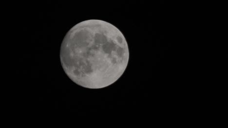 Eclipse-of-the-moon-behind-the-clouds-dramatic-movie