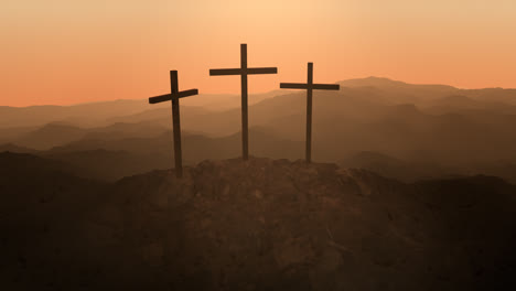 Atmospheric,-dramatic-dark-image-of-three-crosses-silhouetted-on-the-top-of-a-mountain.-Conceptual-image-of-the-biblical-Golgotha-mountain-in-Jerusalem,-where-Crucifixion-of-Christ-took-place.