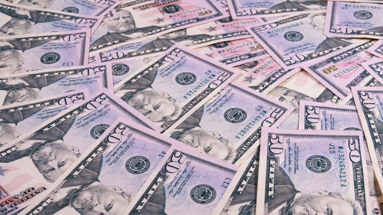 fondo de los billetes estadounidenses de valor de 50 dólares girar