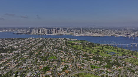 san diego california aerial v62 panning view flyover glorietta bay capturing coronado neighborhood, bayfront municipal golf course and downtown cityscape - shot with mavic 3 cine - september 2022