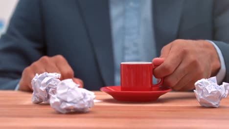 casual businessman drinking his coffee