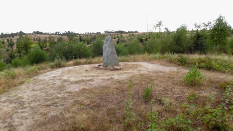 Old-large-stone-altar-in-the-forest-of-Leśno,-Chojnice-County,-Poland--aerial