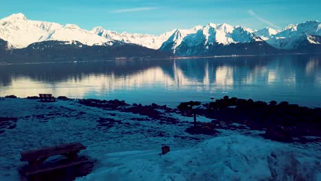 4K-Drone-Video-of-Snow-Covered-Mountains-Surrounding-Seward,-Alaska-During-Winter