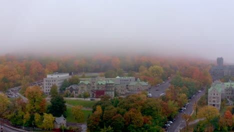 aerial shot of the mount-royal mountain on a misty fall dawn