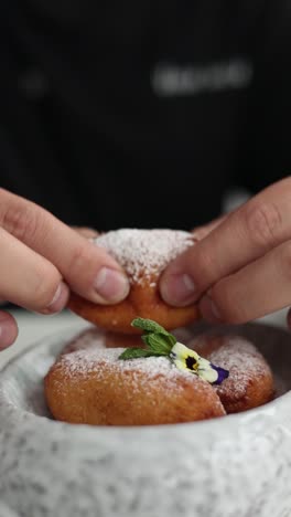 chef presenting delicious donuts