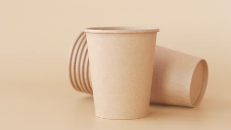 stack of brown paper cups