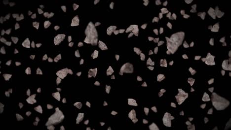 volando muchas piedras de roca en fondo negro. explosión de salpicaduras rotas. concepto de desafío. animación 3d de salpicadas de piedra girando. animación de bucle.