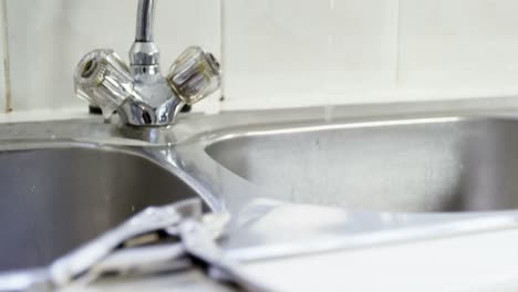 close-up of tool on kitchen sink