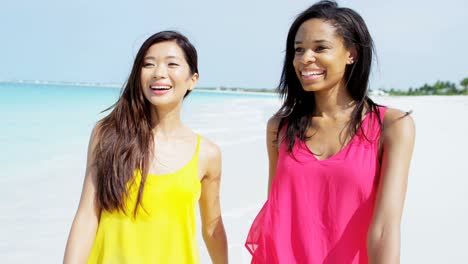 smiling carefree multi ethnic female on vacation beach