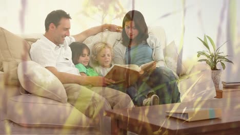 Animation-of-grass-over-caucasian-family-reading-books
