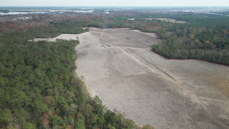 Aerial-flight-over-mixed-woodland-deforestation-for-monocrop