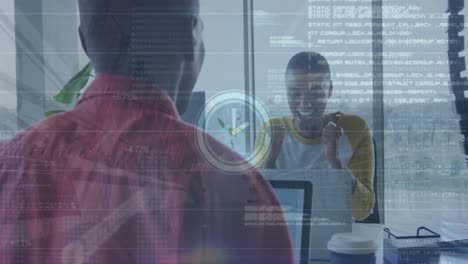 Animation of data processing and clock over diverse business people in office
