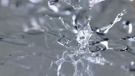 water splashing and droplets on a surface